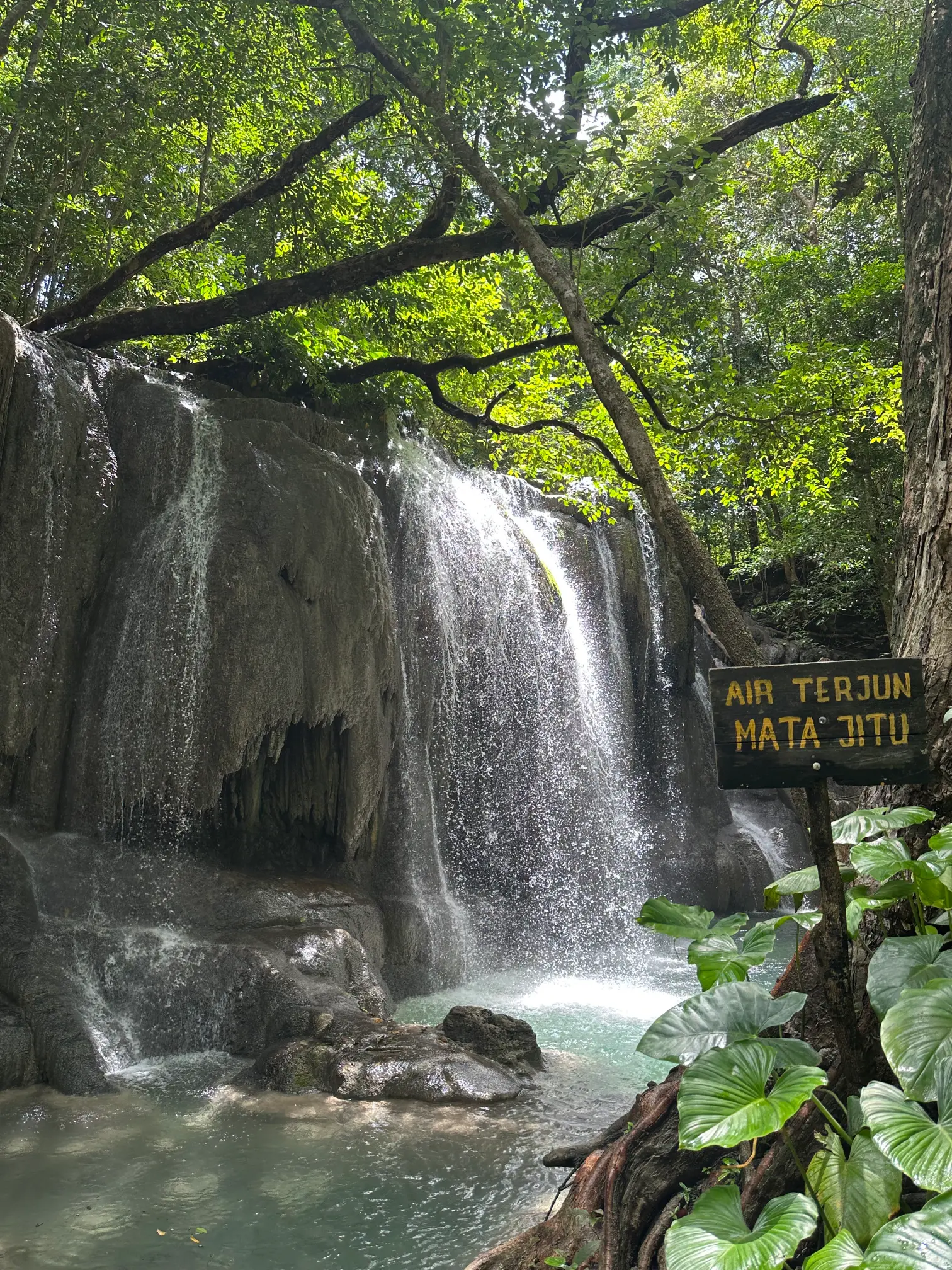 Waterfall with name sign