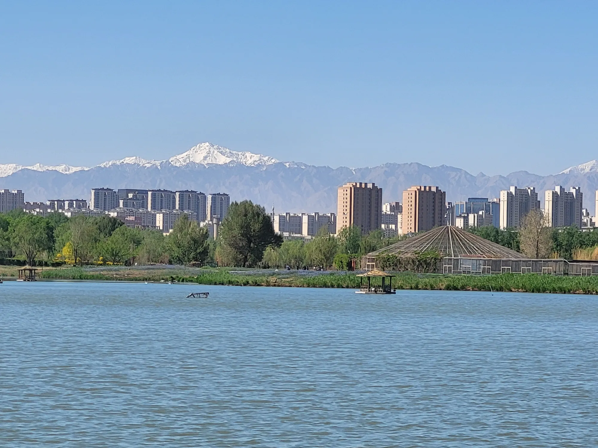 Lake with city and mountain view